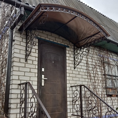 Козырек кованый из поликарбоната