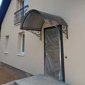 Козырек кованый из поликарбоната